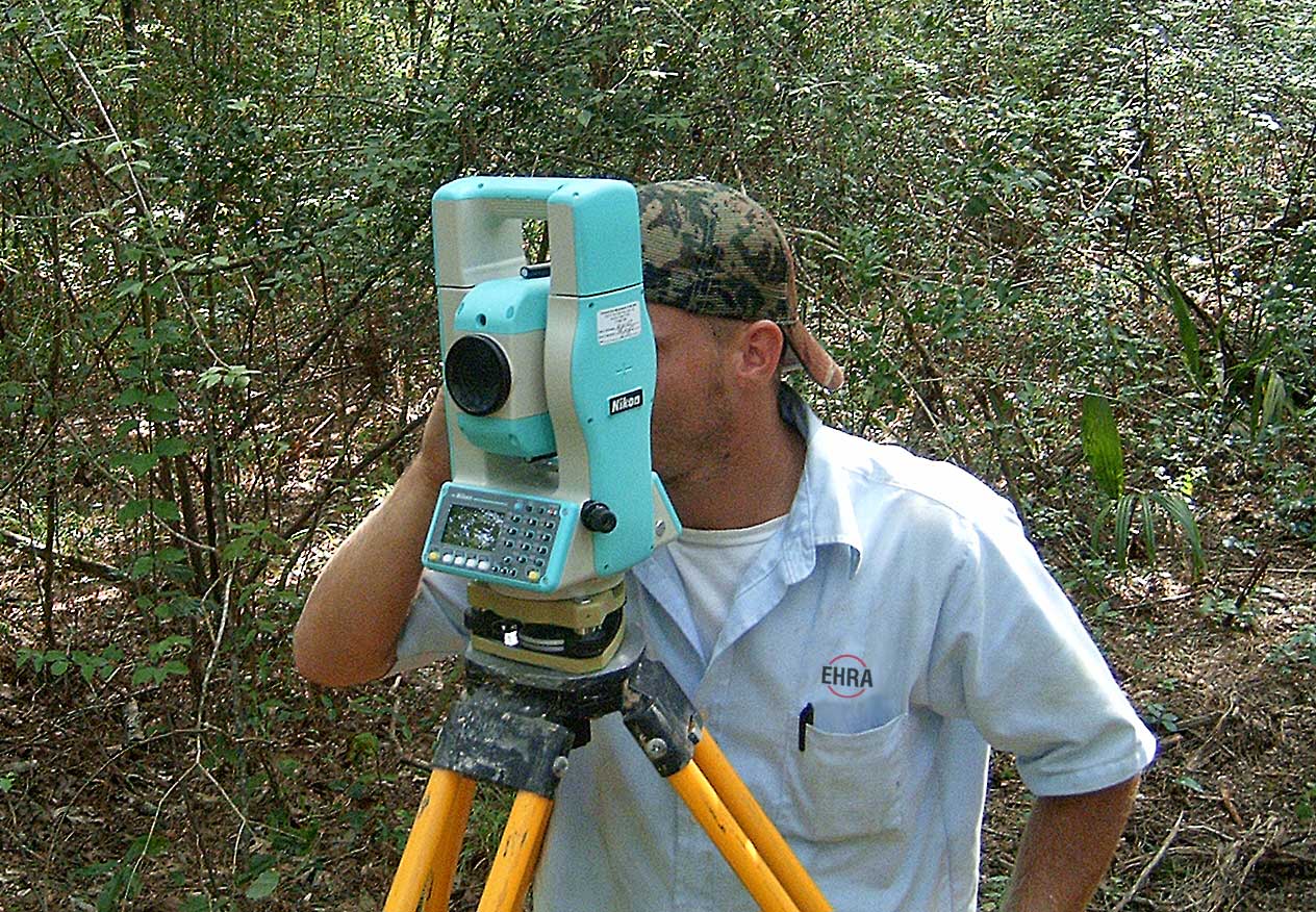 Surveyor working with a total station